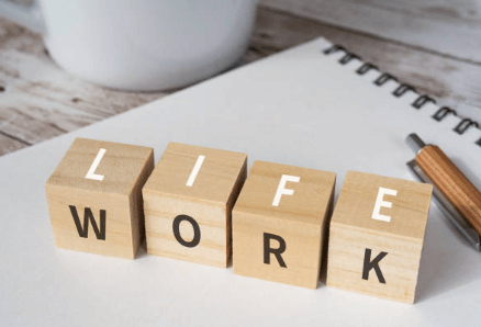 Career Coaching with four wooden blocks on a table with the words life and work